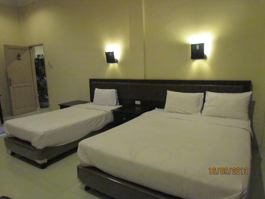 Hotel Carolina Transit Medan Pokoj fotografie