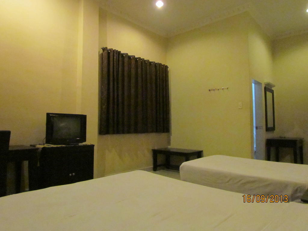 Hotel Carolina Transit Medan Pokoj fotografie