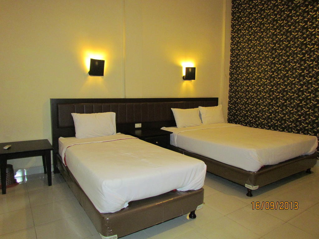 Hotel Carolina Transit Medan Pokoj fotografie